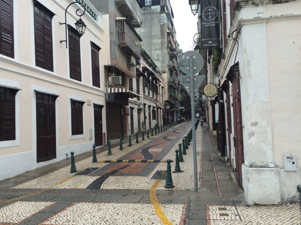 a street with buildings and signs