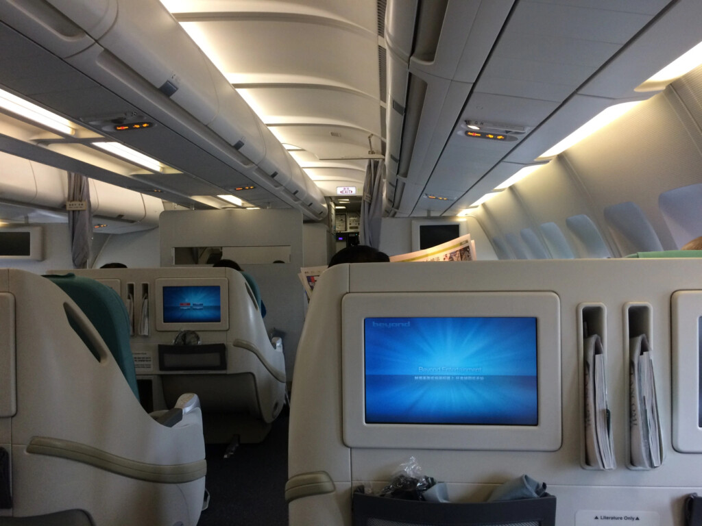 a plane with seats and a television