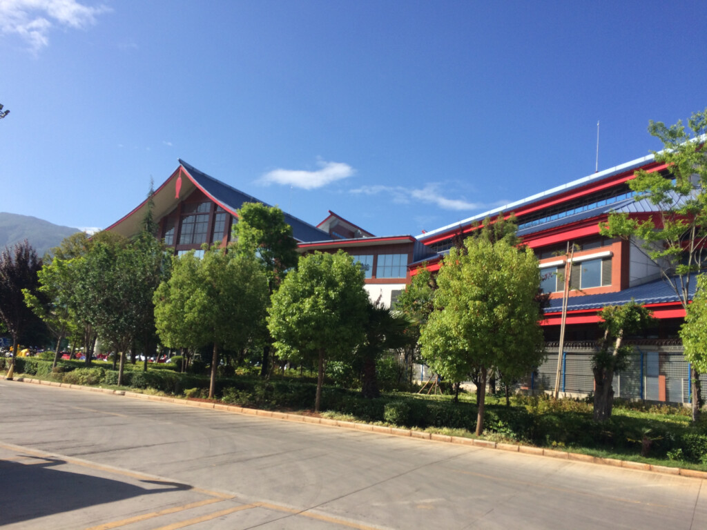 a building with trees in front of it