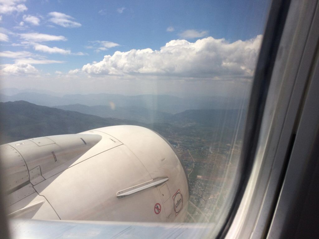 a view of the wing of an airplane from a window