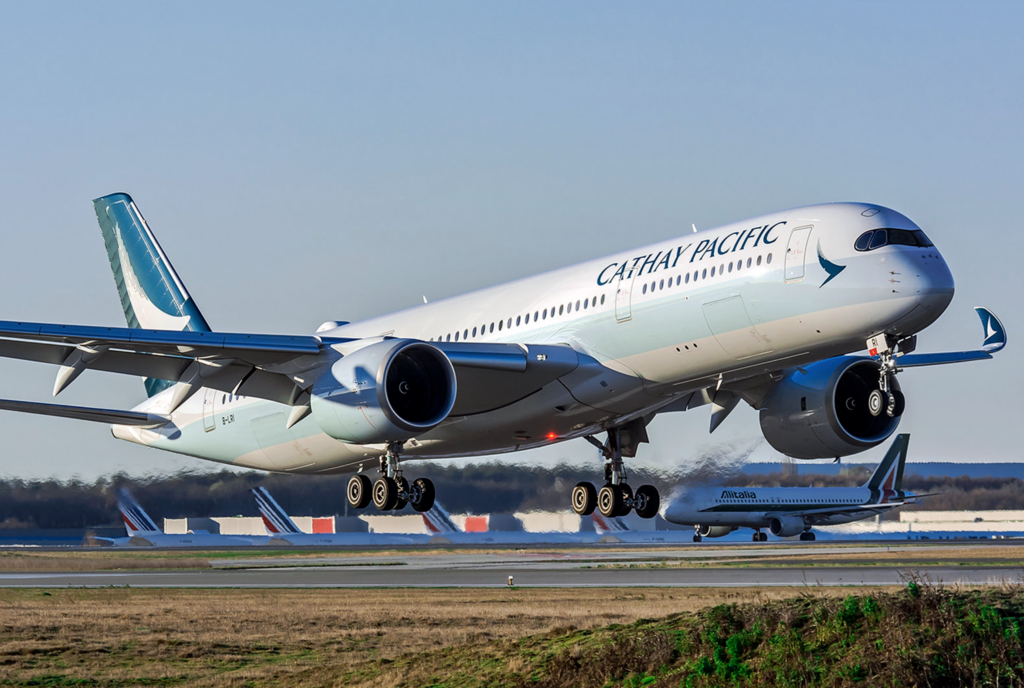 a large white airplane taking off