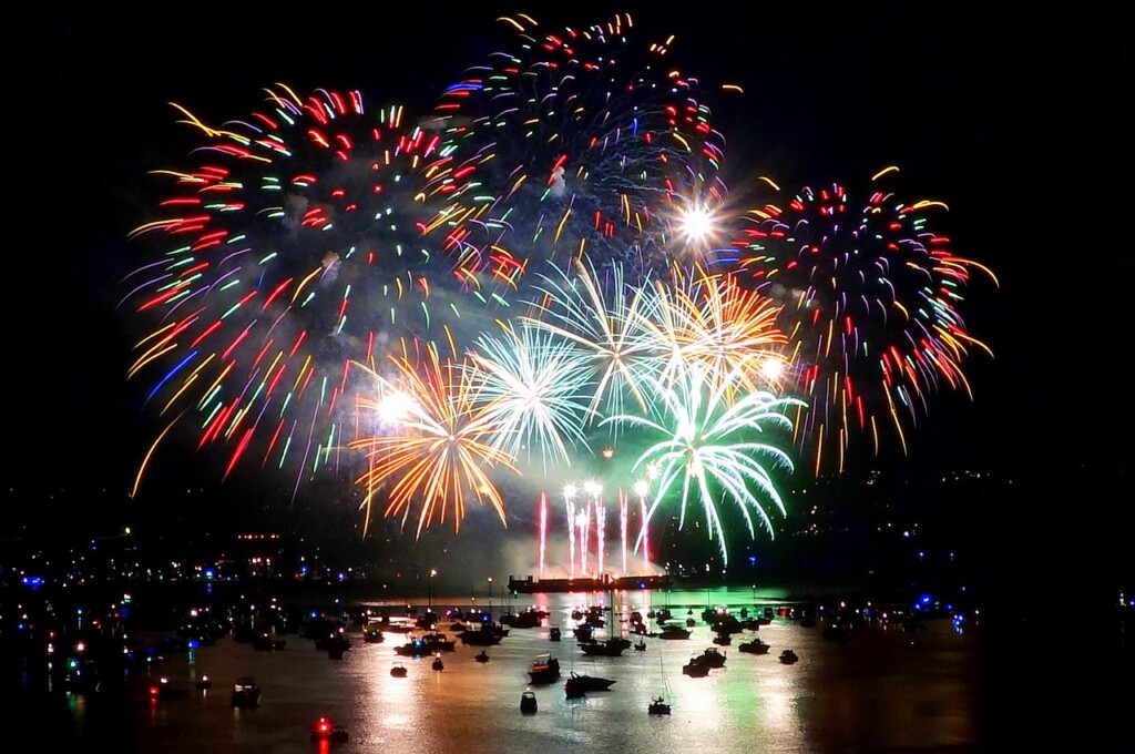 fireworks in the sky over water