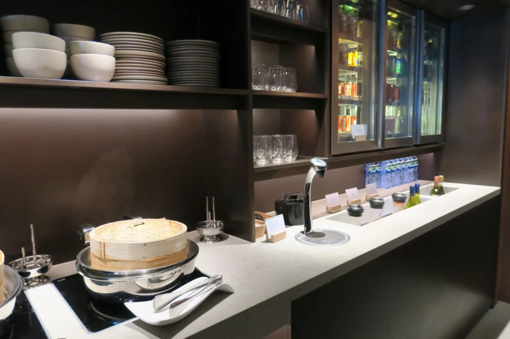 a counter with plates and bowls on it