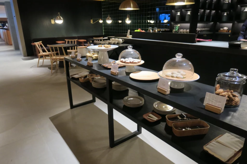 a display of plates and dishes on a shelf