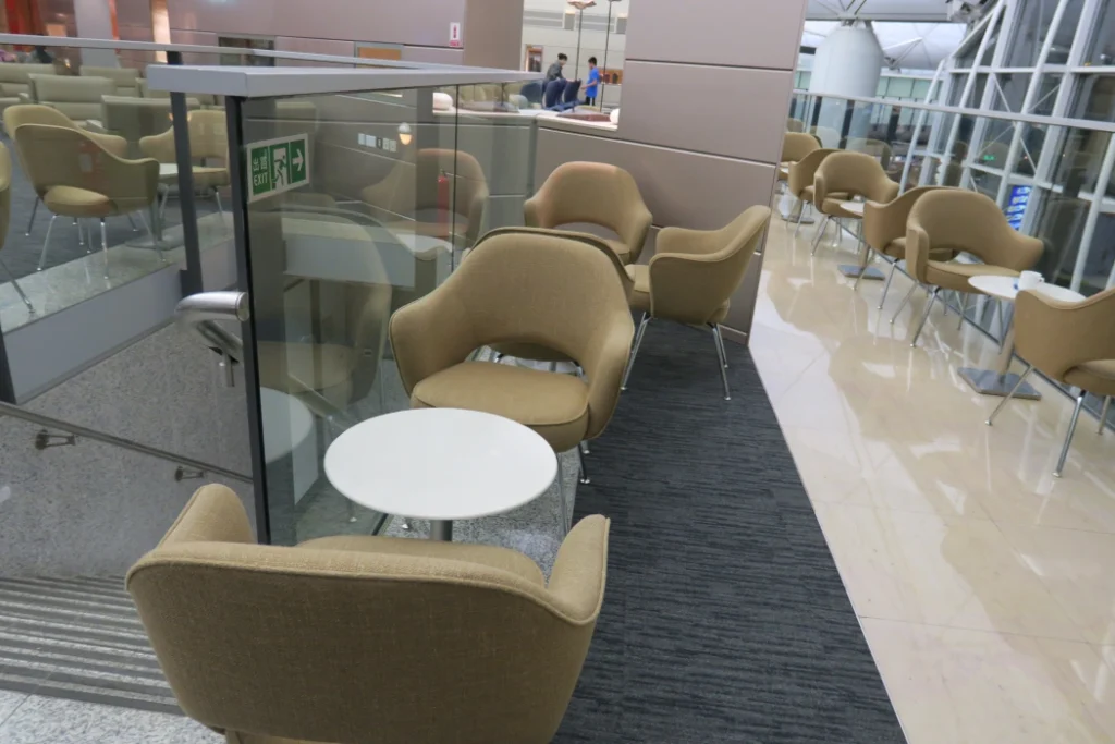 a group of chairs and a table in a room