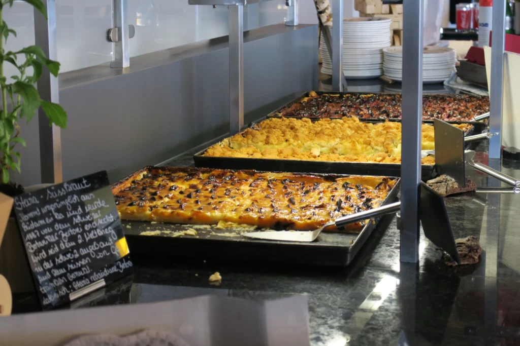 a trays of food on a counter