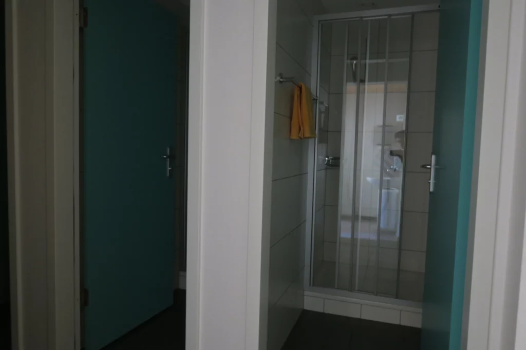 a shower with a glass door