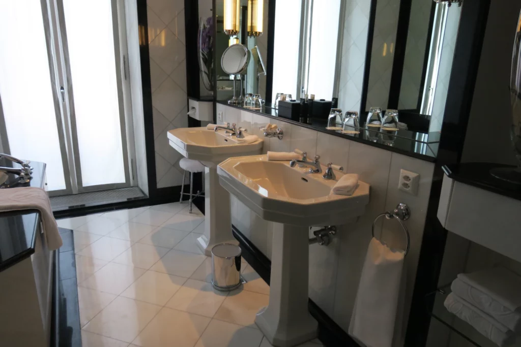 a bathroom with sinks and mirrors