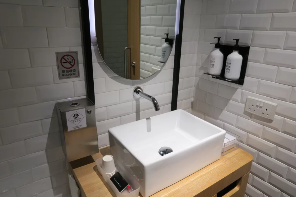 a sink and mirror in a bathroom