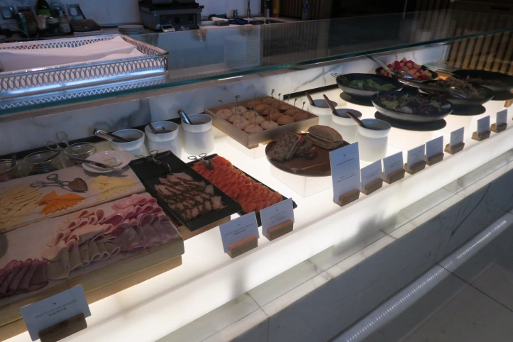 a buffet with different foods on it