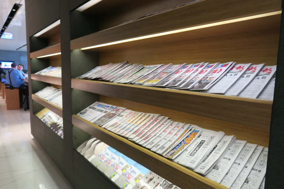 a shelf with magazines on it
