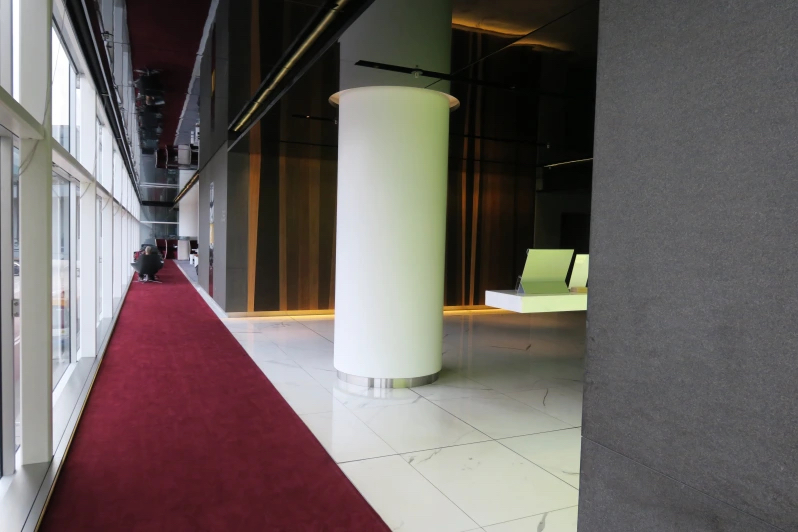 a white pillar in a room