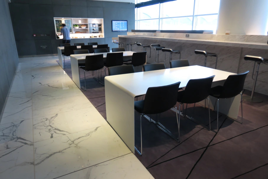a room with a table and chairs