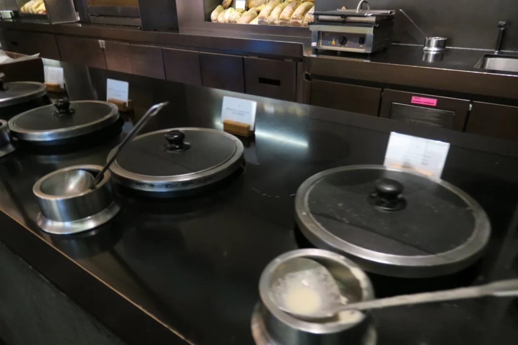 a kitchen with pots and pans