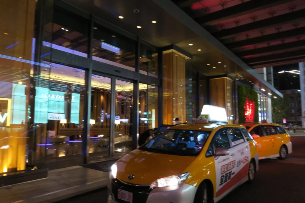 a taxi parked on the street