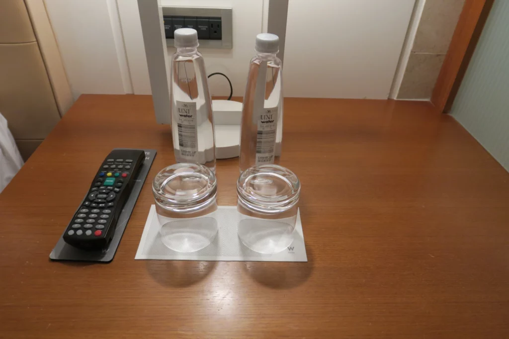 a group of clear bottles on a table