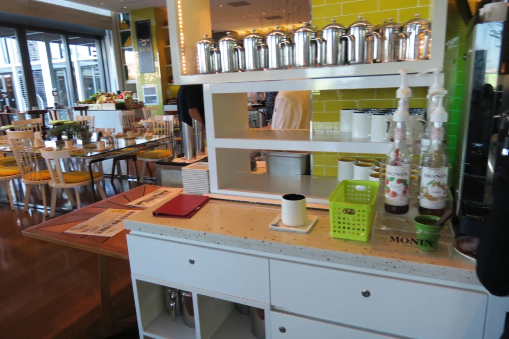 a counter with silver containers on it