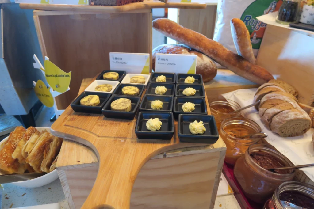 a tray of food on a wooden board