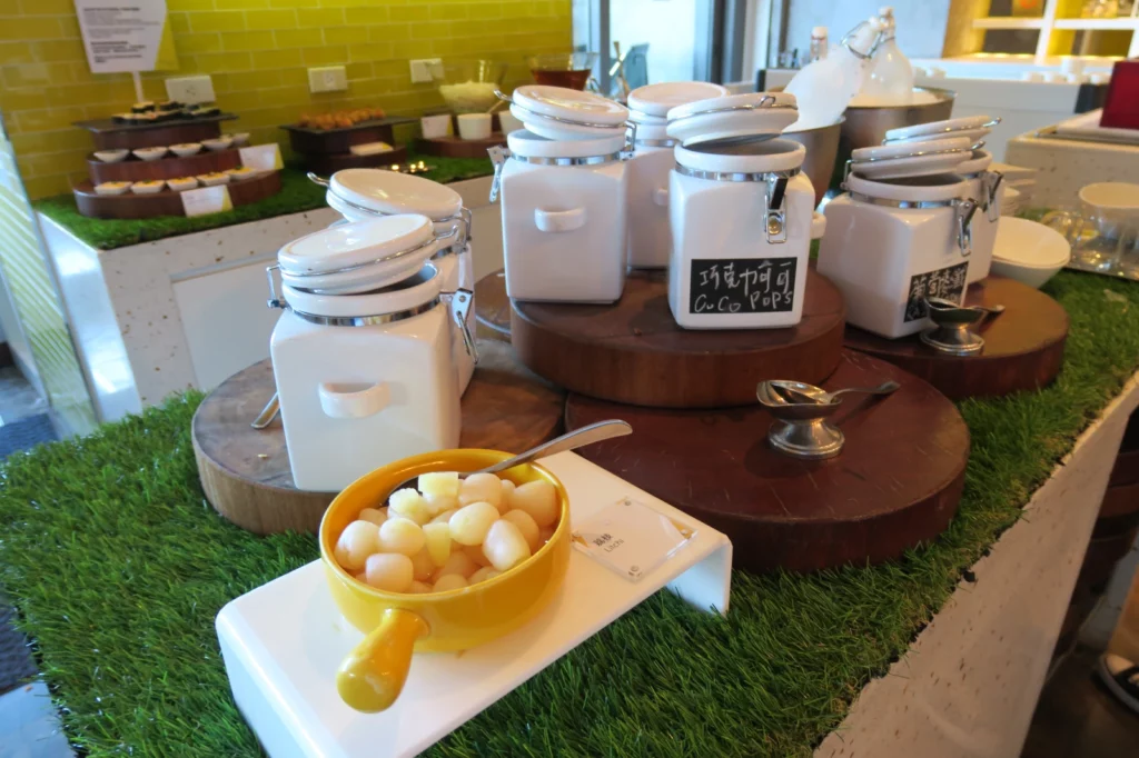 a group of white containers on a table