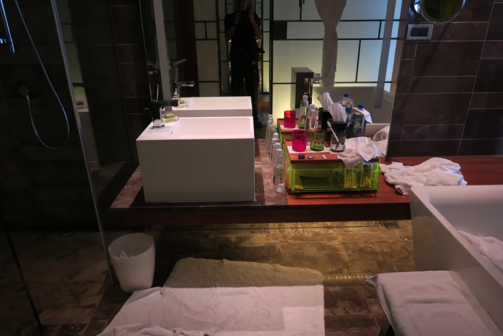 a bathroom with a sink and towels