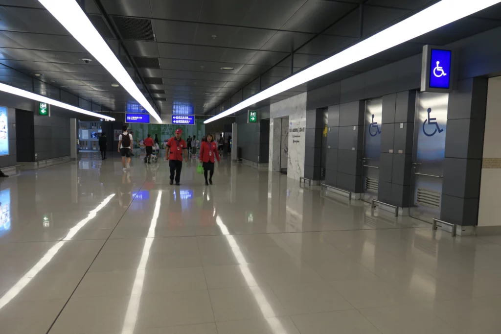 people walking in a large hall