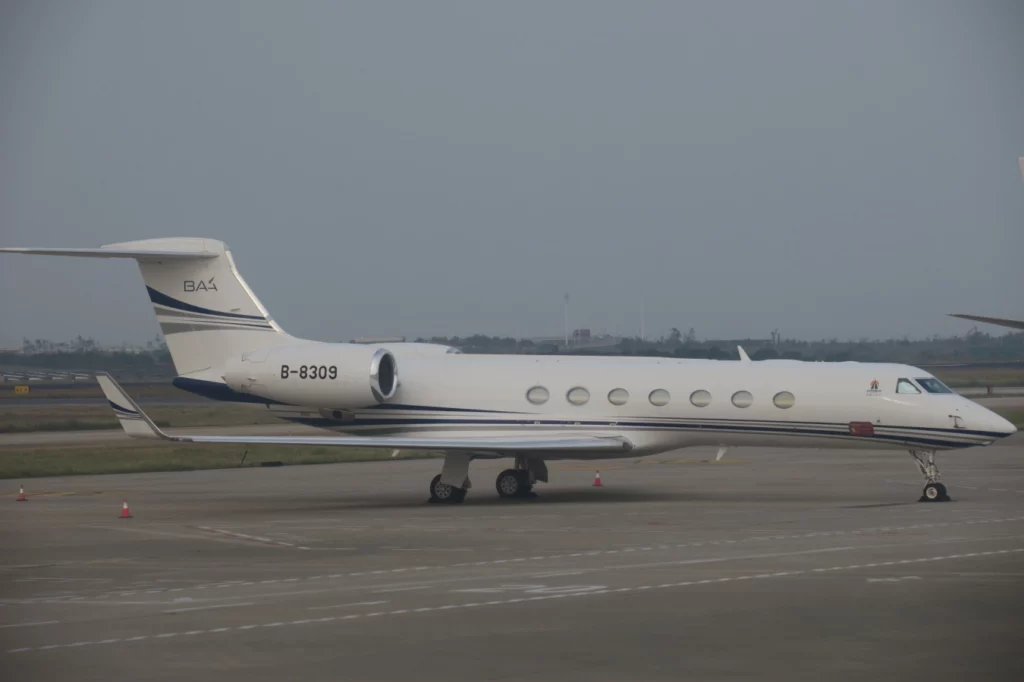 a white airplane on a runway