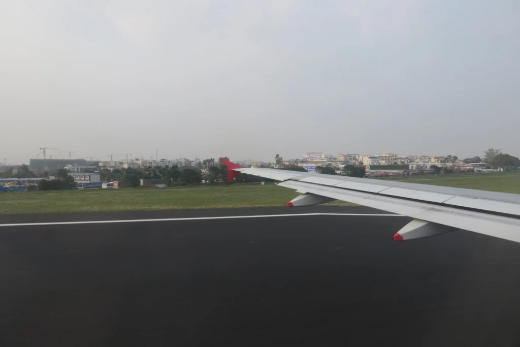 an airplane wing on a runway