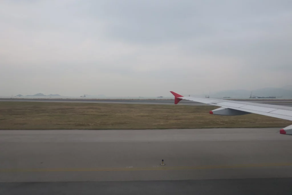 an airplane wing on a runway