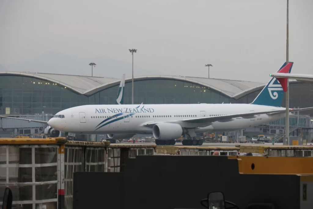 a white airplane on a runway