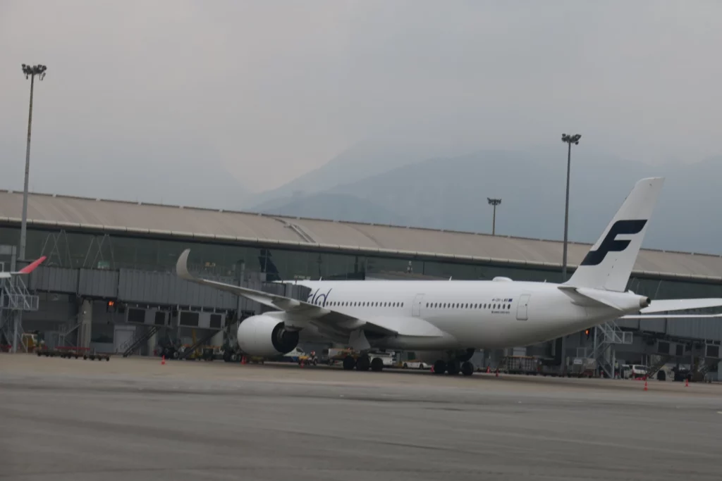 a white airplane on a tarmac