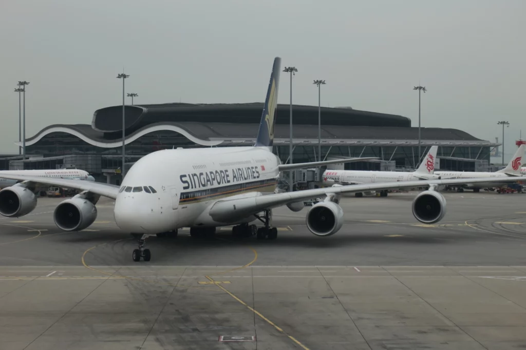 a large white airplane on a tarmac