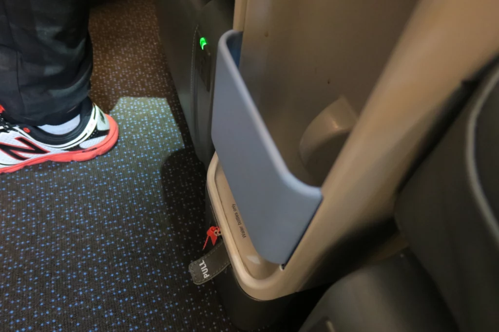 a person's feet in a chair