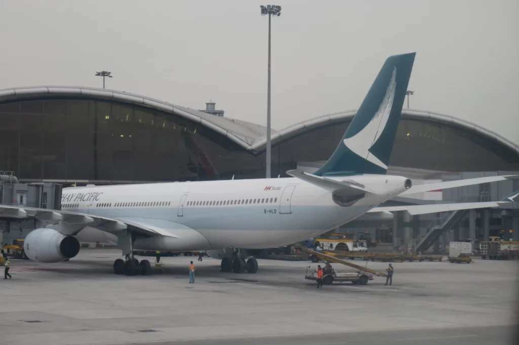 a large white airplane on a tarmac