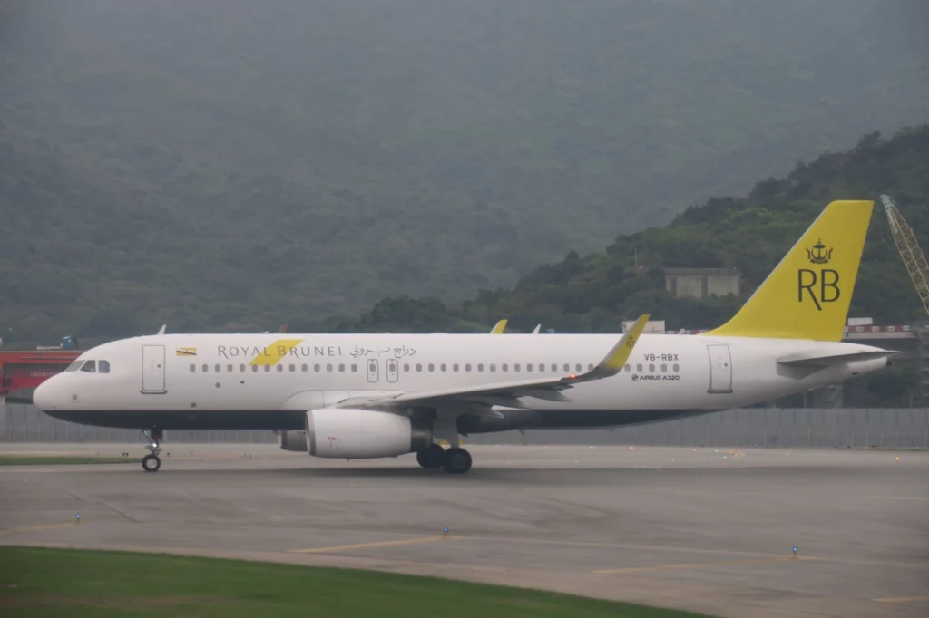 a white airplane on a runway