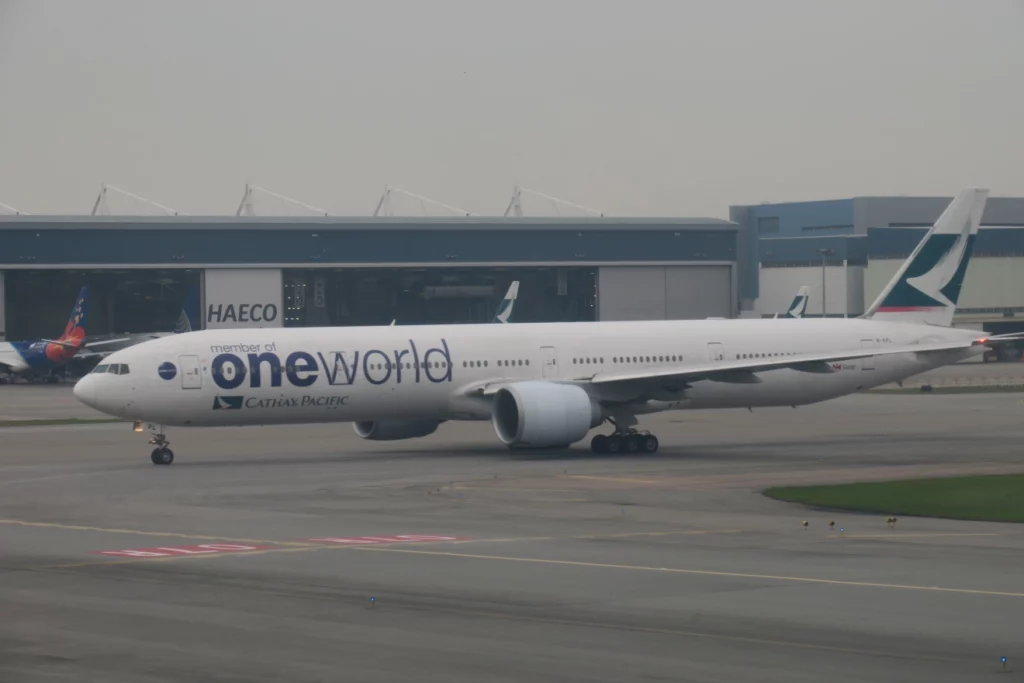 a white airplane on a runway