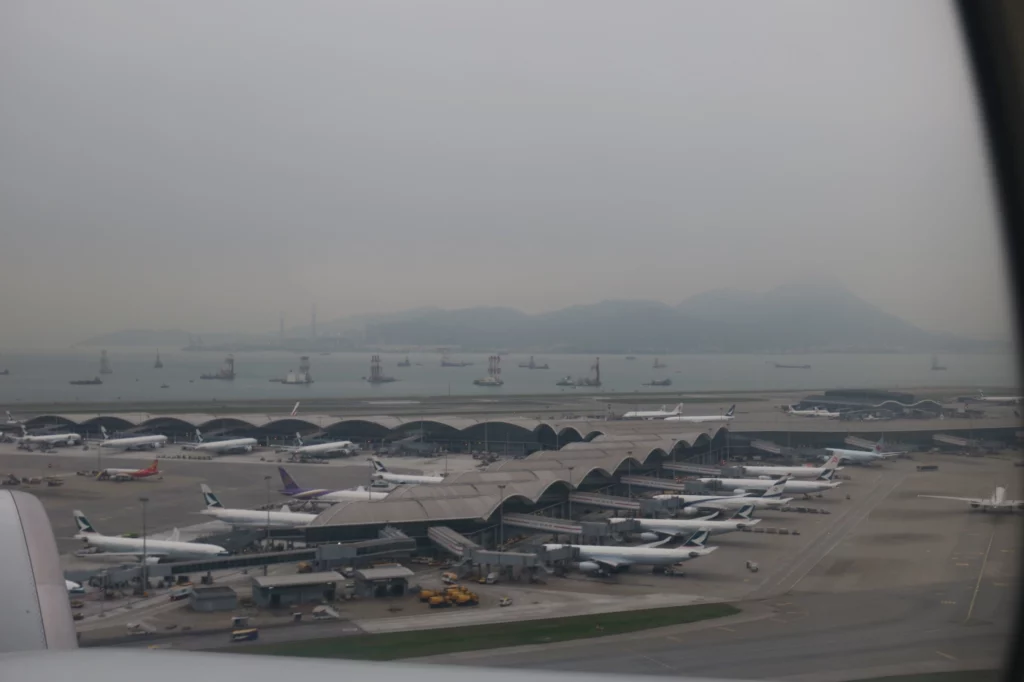 a group of airplanes at an airport