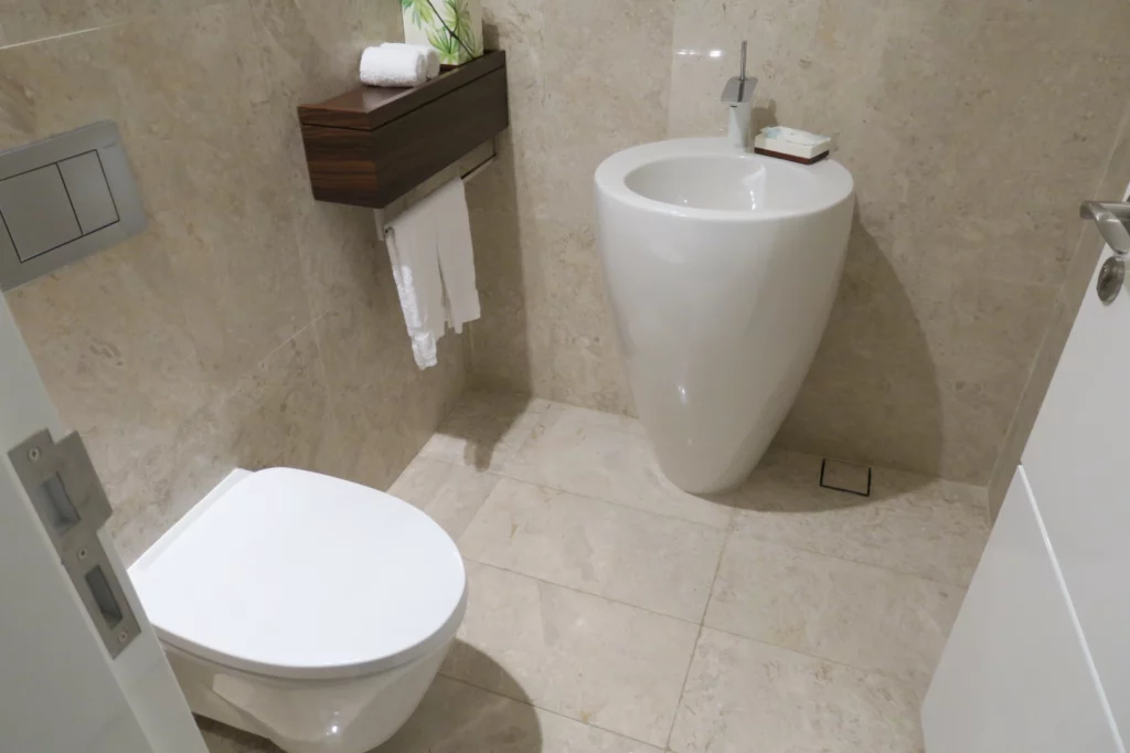 a bathroom with a sink and toilet