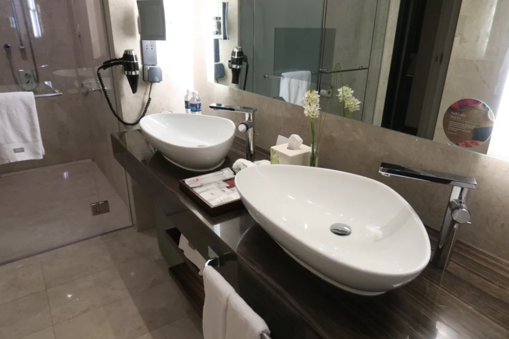 a bathroom with two sinks