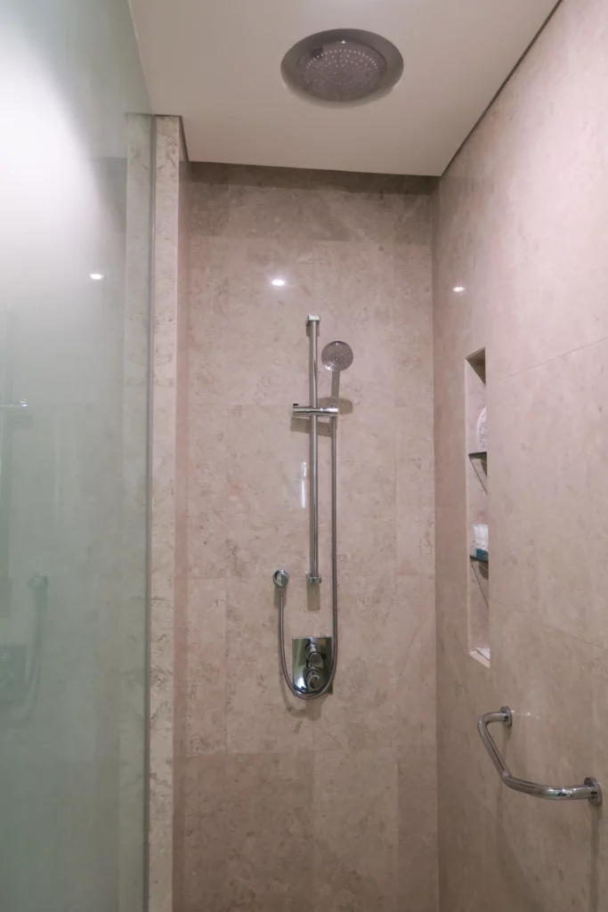 a shower with a shower head