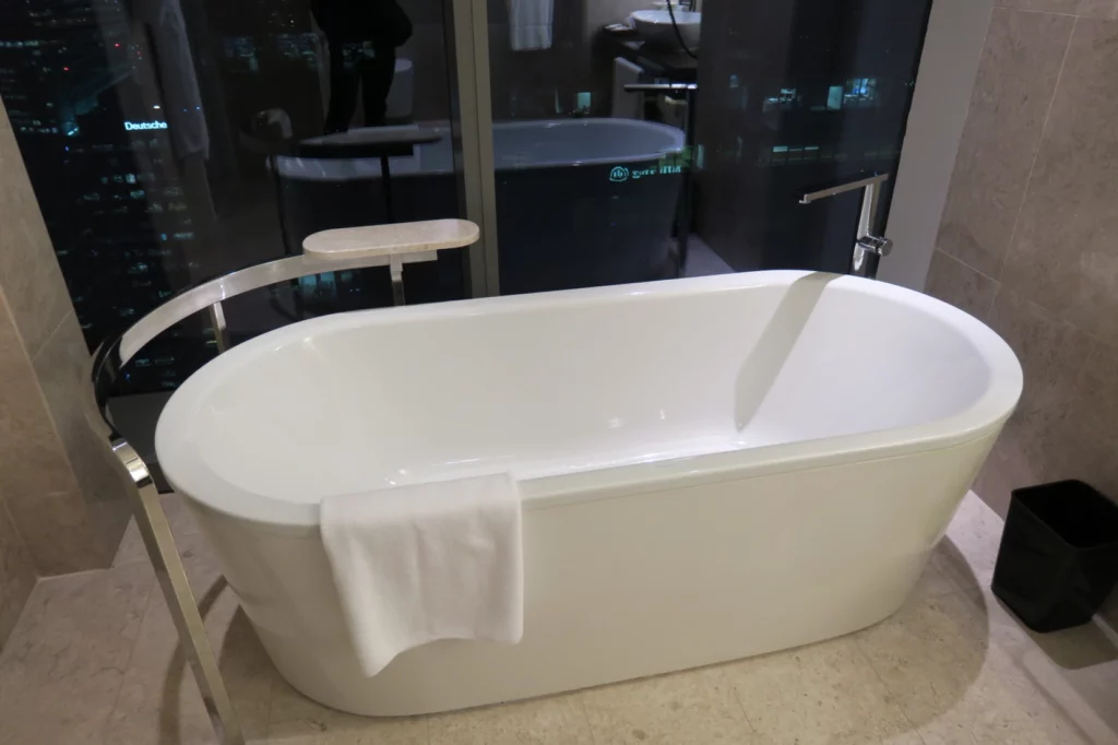 a white bathtub in a bathroom