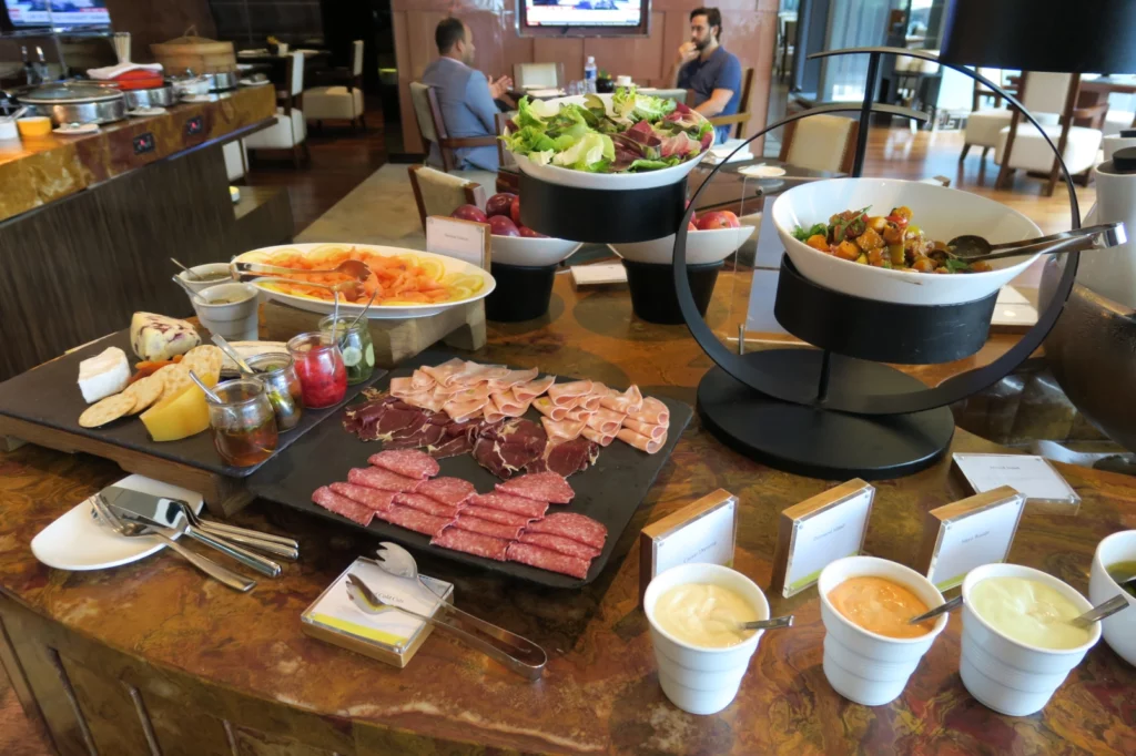 a buffet table with food and drinks