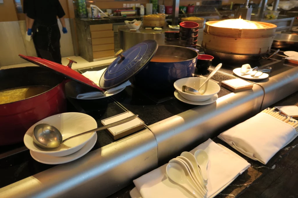 a kitchen with a variety of dishes and utensils