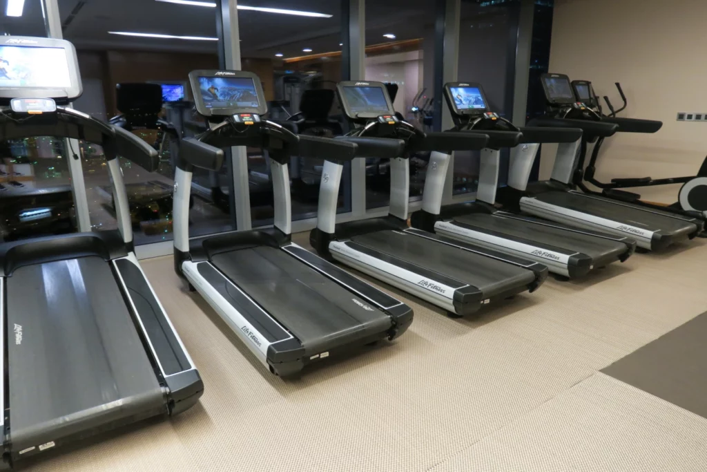 a group of treadmills in a room