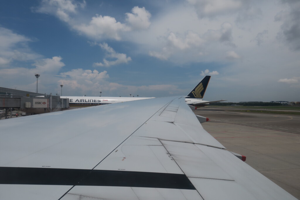 an airplane wing on a runway