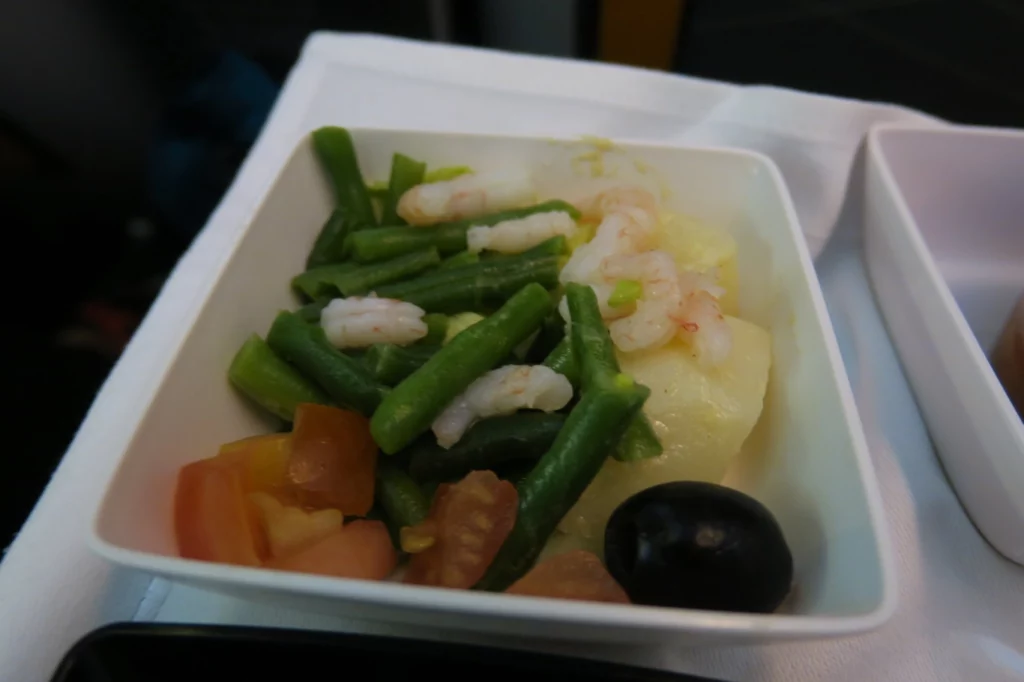 a bowl of food on a napkin