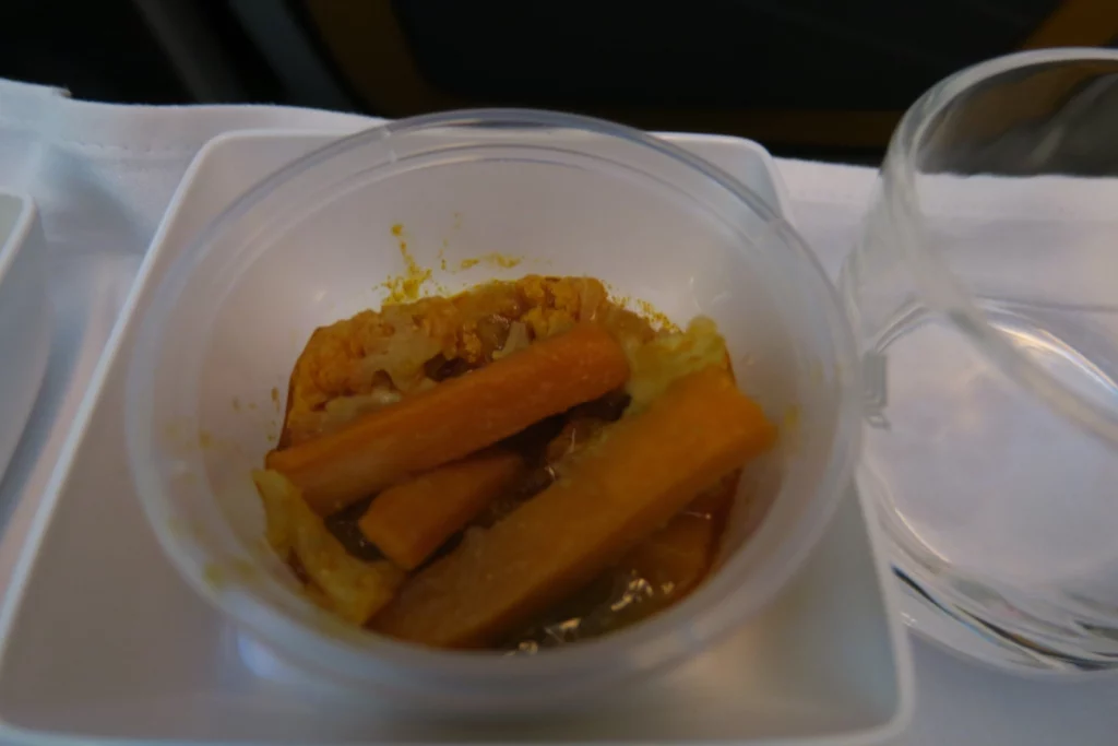 a plastic container with food in it