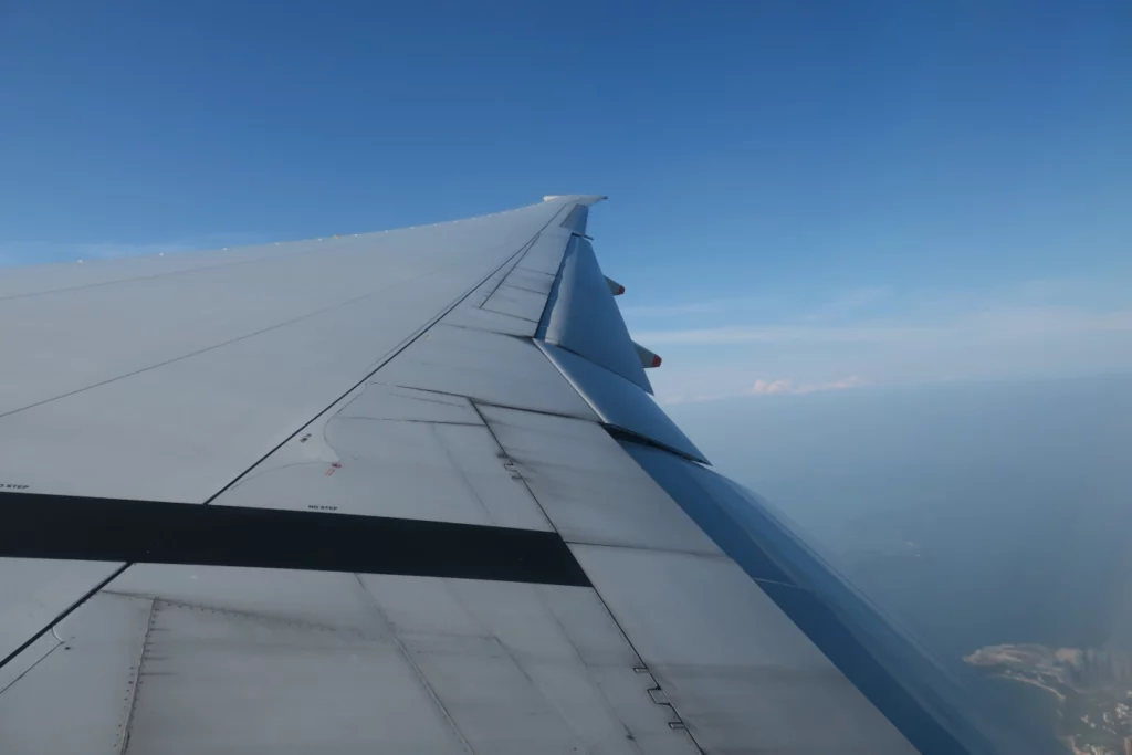 an airplane wing in the sky