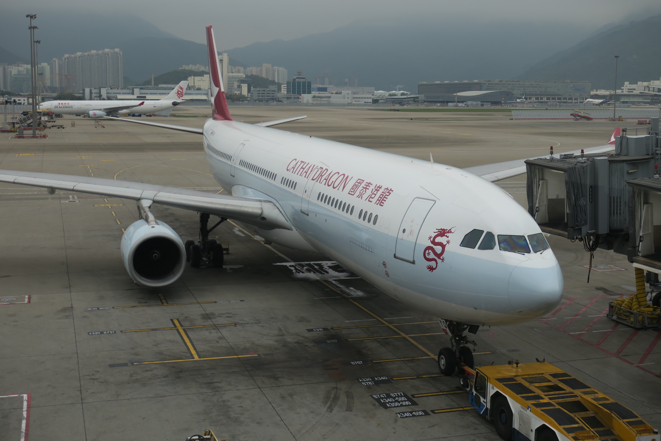 a large white airplane on a runway