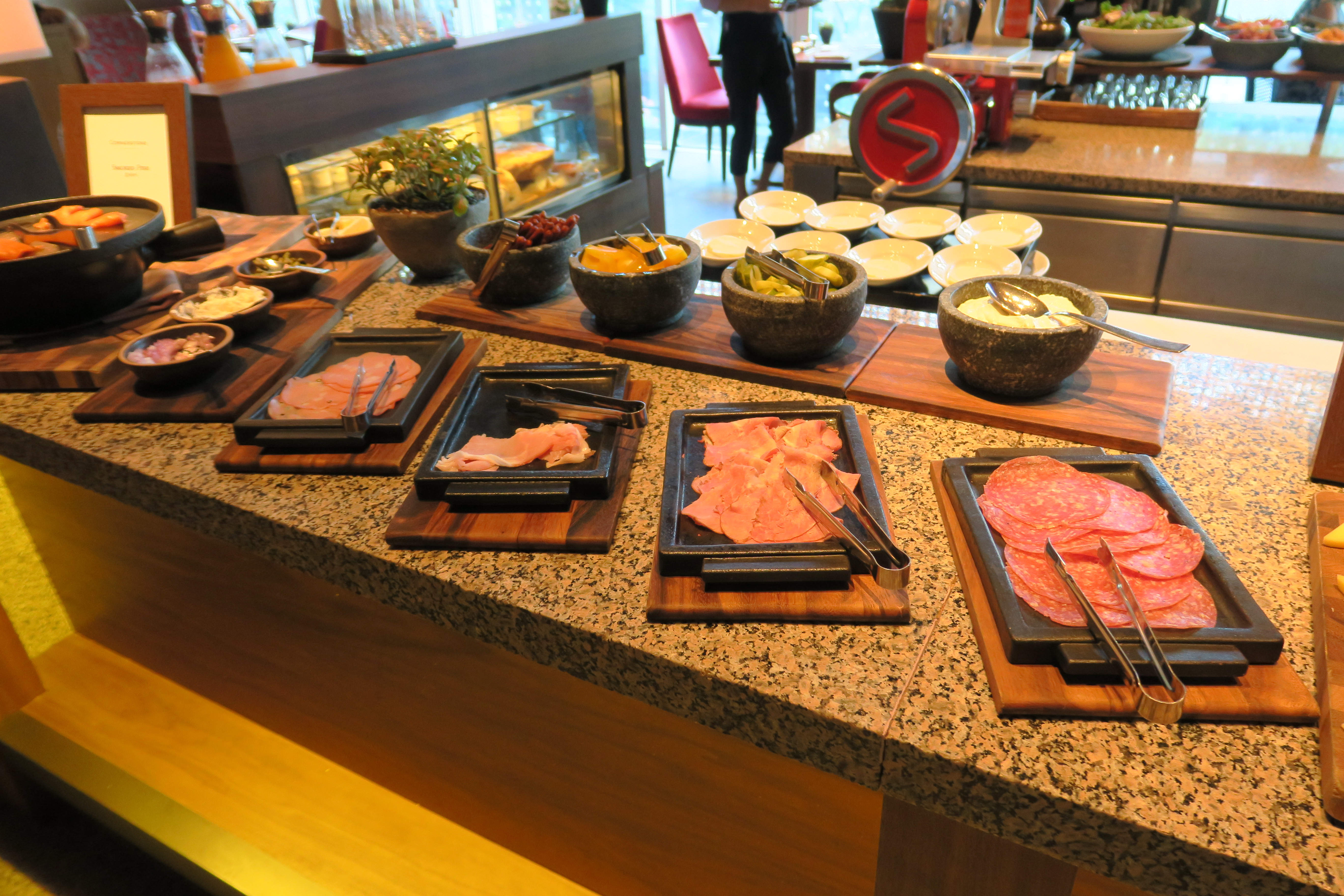 a buffet table with different food items on it