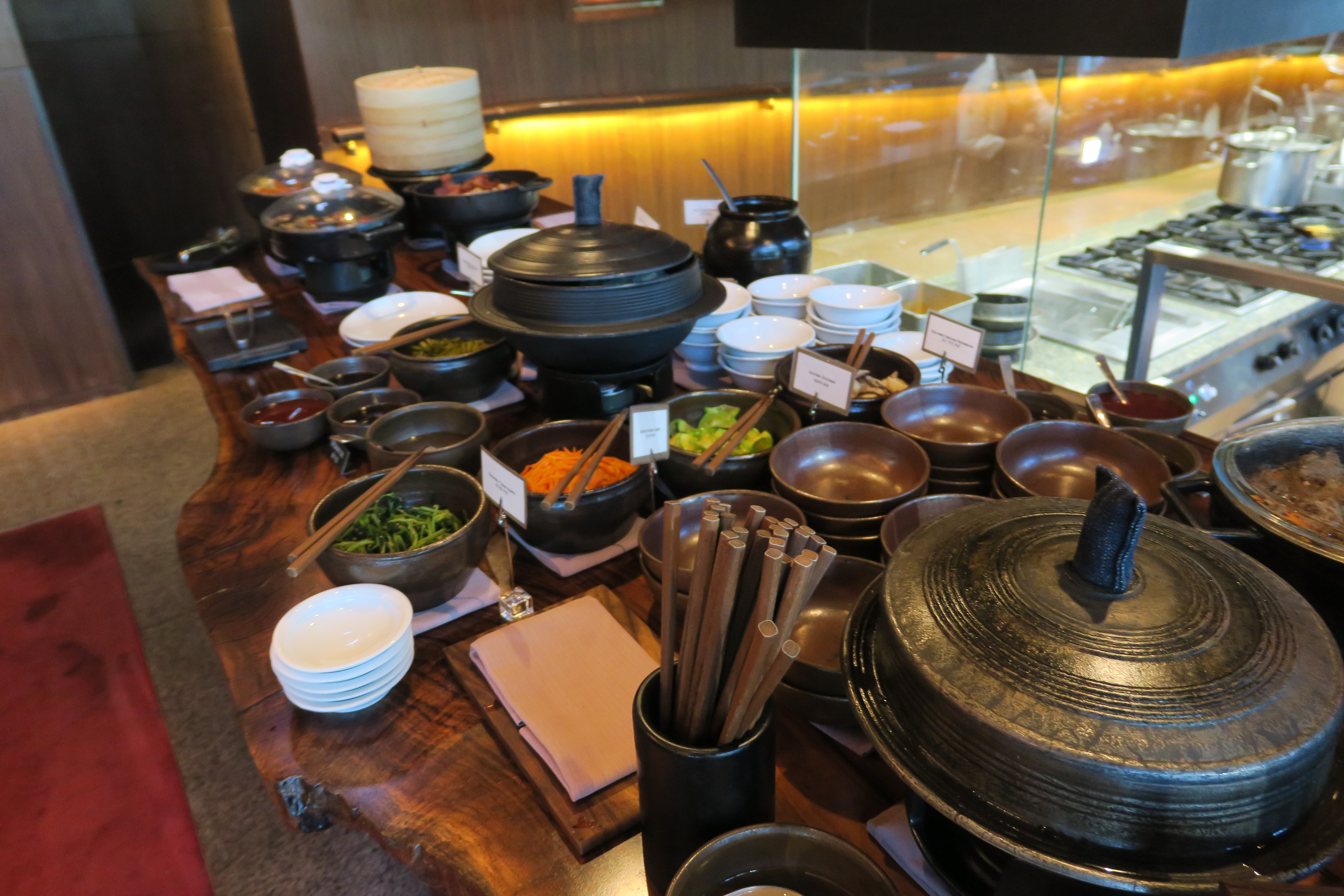 a table with bowls and bowls on it